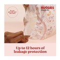 Cleaning & Janitorial Supplies | Huggies 56432 Snug and Dry 8 lbs. to 14 lbs. Diapers - Size 1 (128/Carton) image number 3