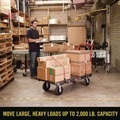 Utility Carts | Rubbermaid Commercial FG444100BLA 24 in. x 48 in. x 7 in. 2000 lbs. Capacity Platform Truck - Black image number 4