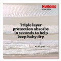 Cleaning & Janitorial Supplies | Huggies 56432 Snug and Dry 8 lbs. to 14 lbs. Diapers - Size 1 (128/Carton) image number 3
